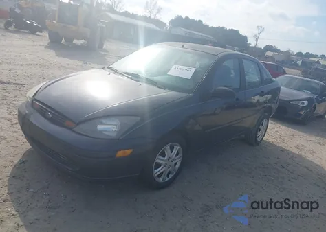 2004 Ford Focus Se z USA, uszkodzony, nr VIN 1FAFP34354W113883